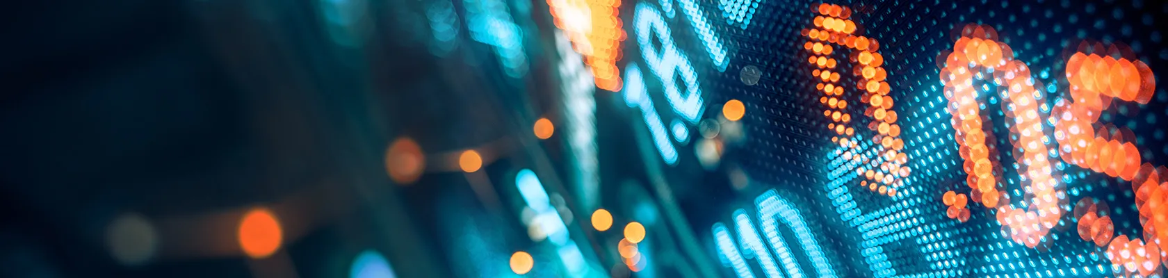 Ein Börse-Hintergrunddesign steht symbolisch für die Frage "Wo stehen die Bauzinsen?".