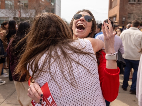 Students and their families celebrate after learning where they will train on Match Day