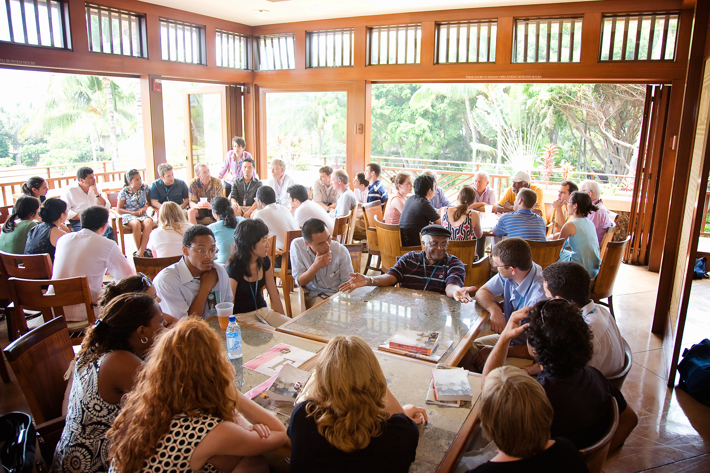 Desmond Tutu and other Academy members join student delegates for informal discussions at the Summit.