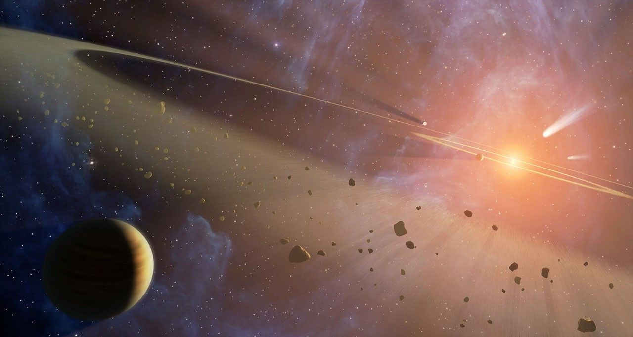 This artist's conception shows the closest known planetary system to our own, called Epsilon Eridani. Observations from NASA's Spitzer Space Telescope show that the system hosts two asteroid belts.
