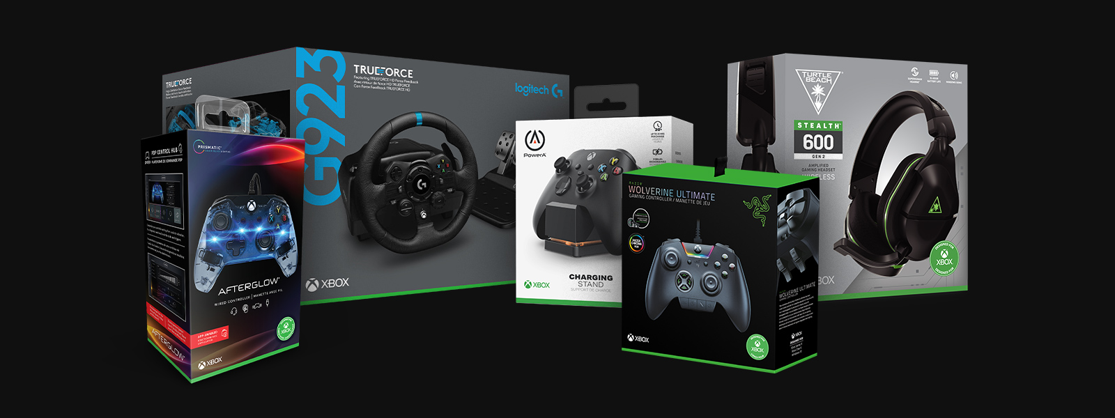 Collection of boxed Xbox accessories including Afterglow controller, Logitech G923 wheel, PowerA charging stand, Razer Wolverine Ultimate controller, and the Turtle Beach Stealth 600 headset.