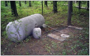 Improperly installed fuel tanks can break free from attachments under the force of flood waters, risking broken fuel lines which could cause fire or explosion. Here, the tank is tethered only by the gas piping, which is not designed to perform this function.