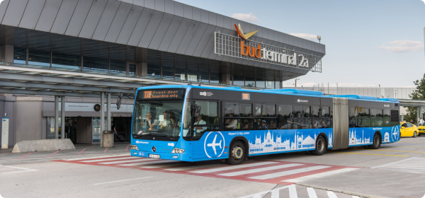 Blue bus staning in front of the bud.terminal 2a station.