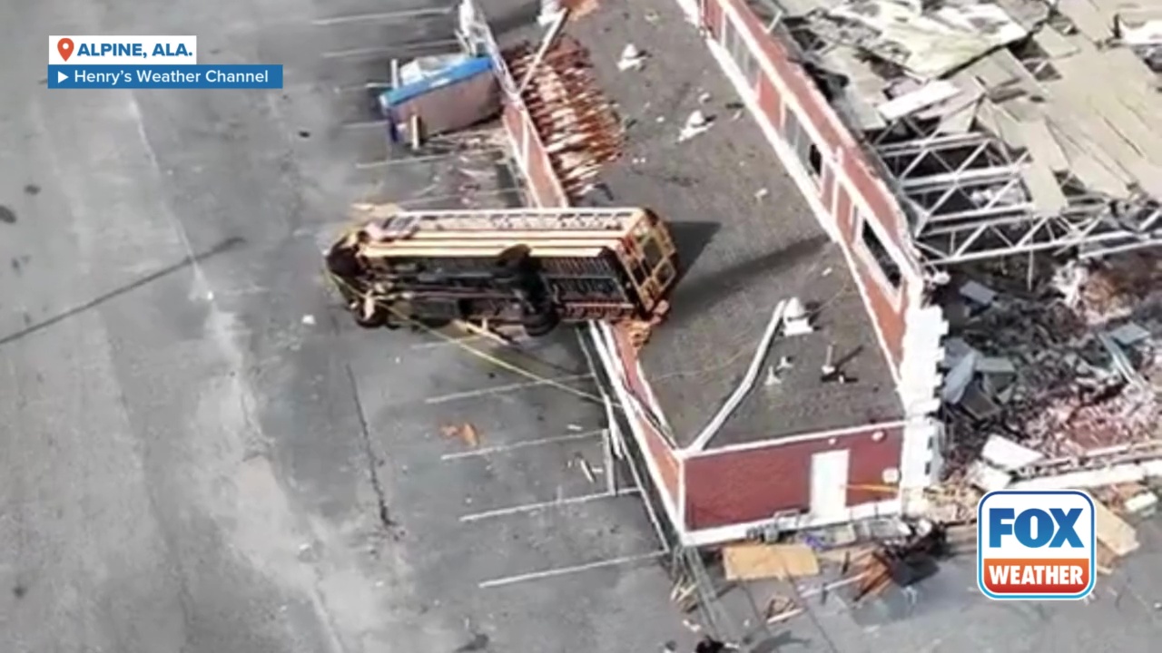 EF-2 tornado flips school bus onto Alabama gym
