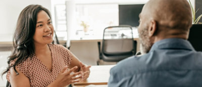 A man and a woman talking each other