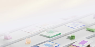 Un gros plan sur plusieurs documents posés sur une étagère blanche.