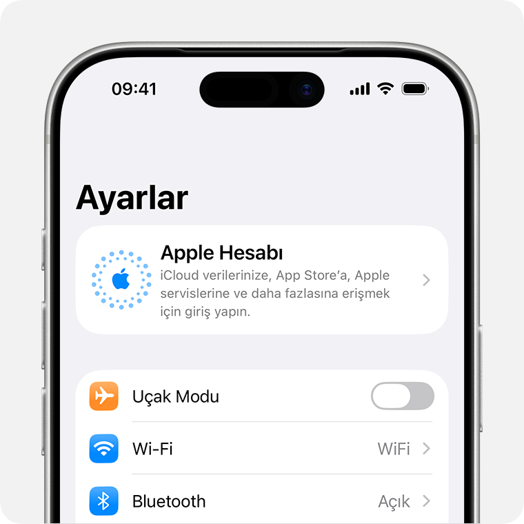 Ayarlar'ı ve Apple Hesabınızla giriş yapabileceğiniz bölümü gösteren iPhone.