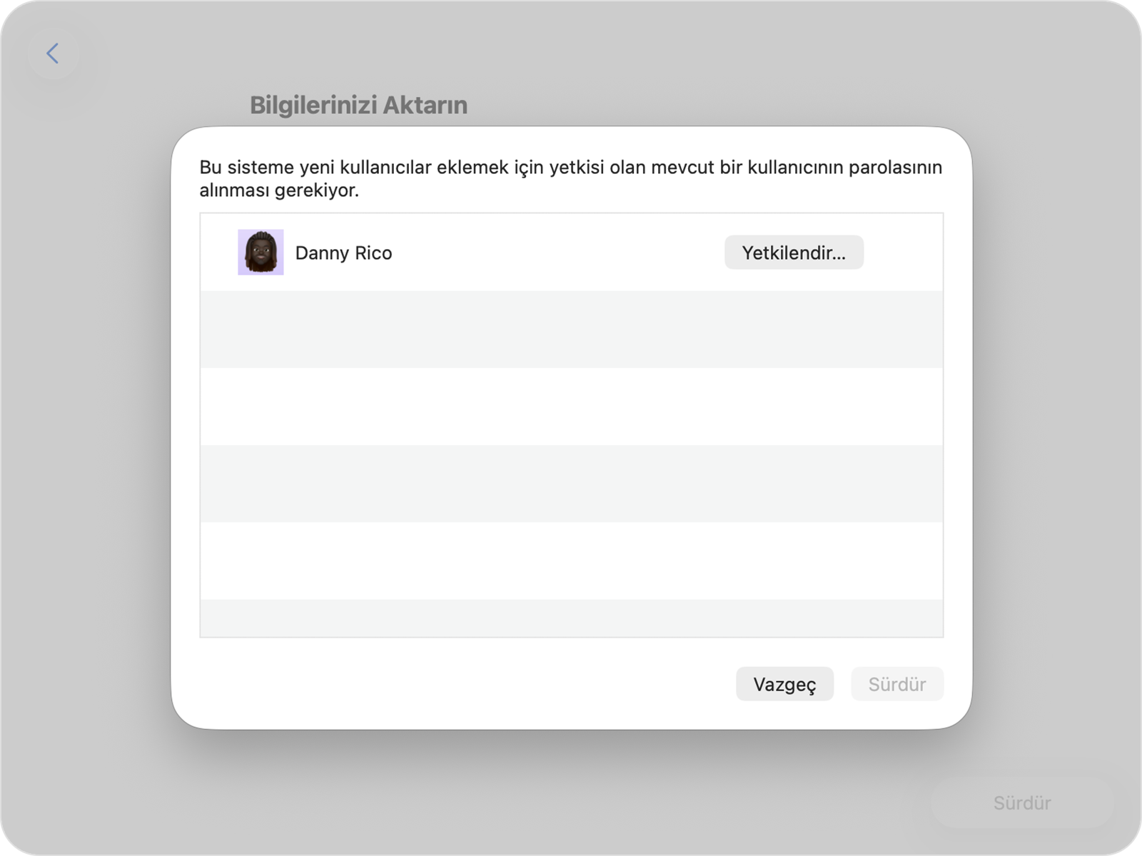 Aktarımı yetkilendirmek için mevcut hesabın parolasını isteyen Geçiş Yardımcısı.