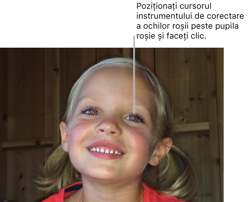 Poza unui copil având pupila roșie.