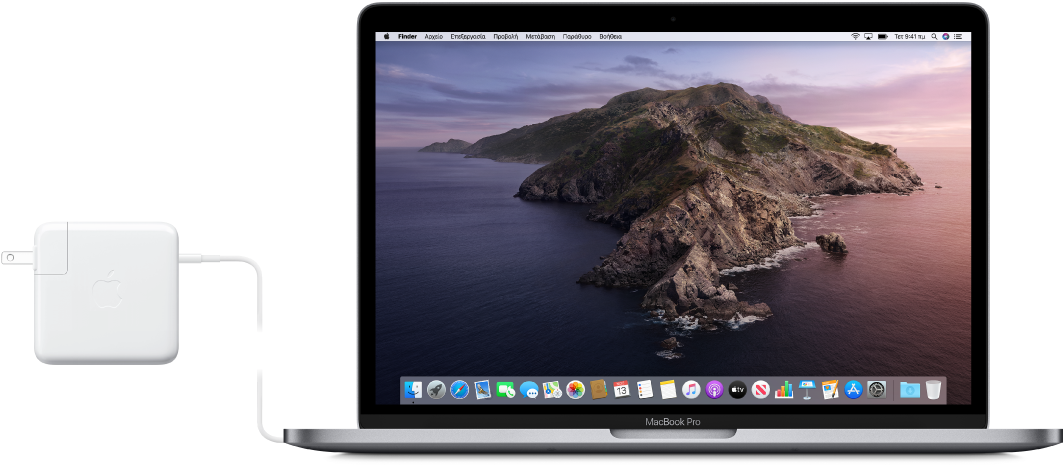 MacBook Pro με συνδεδεμένο το τροφοδοτικό.