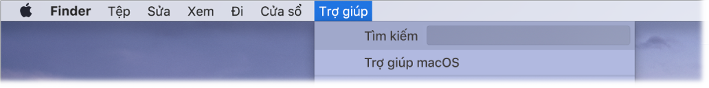 Một phần của màn hình nền với menu Trợ giúp được mở, đang hiển thị các tùy chọn menu Tìm kiếm và Trợ giúp macOS.