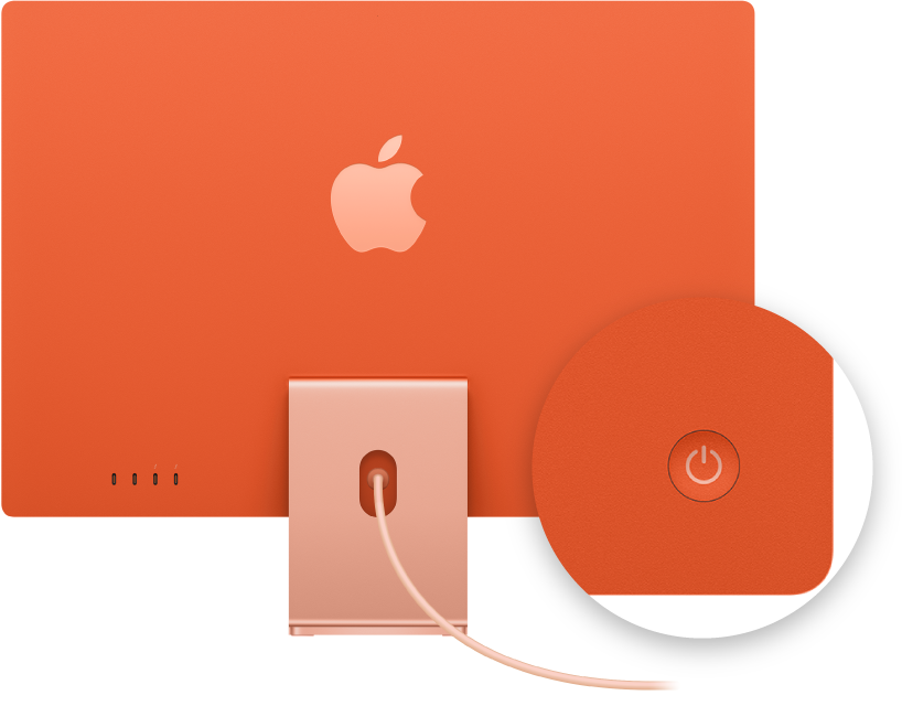Vue arrière de l’iMac 24 pouces avec le bouton d’alimentation mis en évidence.