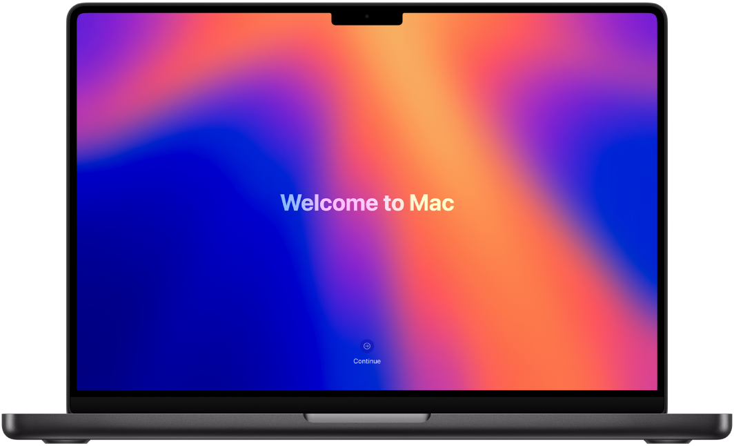 MacBook Pro ouvert avec « Bienvenue sur le Mac » affiché à l’écran.