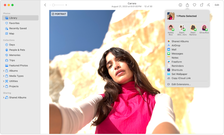 Zdjęcie jest otwarte w oknie Zdjęć. Wybrane jest menu Udostępnij, w którym wyświetlana jest lista aplikacji umożliwiających udostępnienie tego zdjęcia.