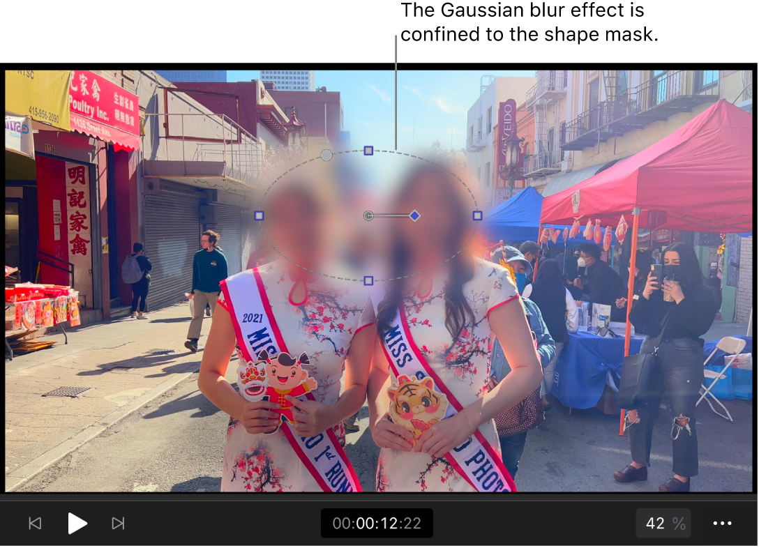 The viewer showing a shape mask confining the Gaussian blur effect to a small oval area of the image.