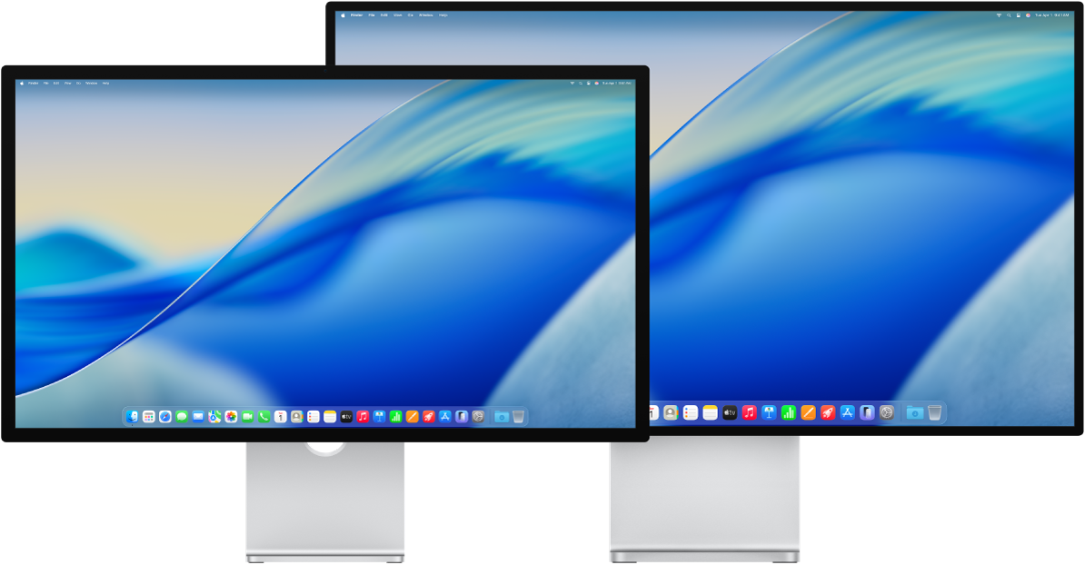 Wyświetlacze Studio Display i Pro Display XDR obok siebie.