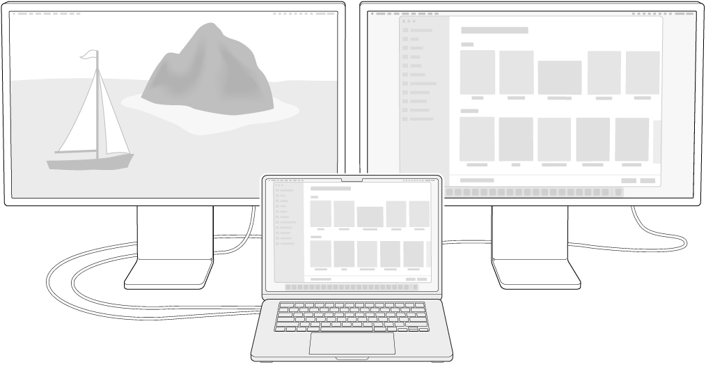 Ένα MacBook Air δίπλα σε δύο οθόνες Studio Display που χρησιμοποιούνται ως εξωτερικές οθόνες.