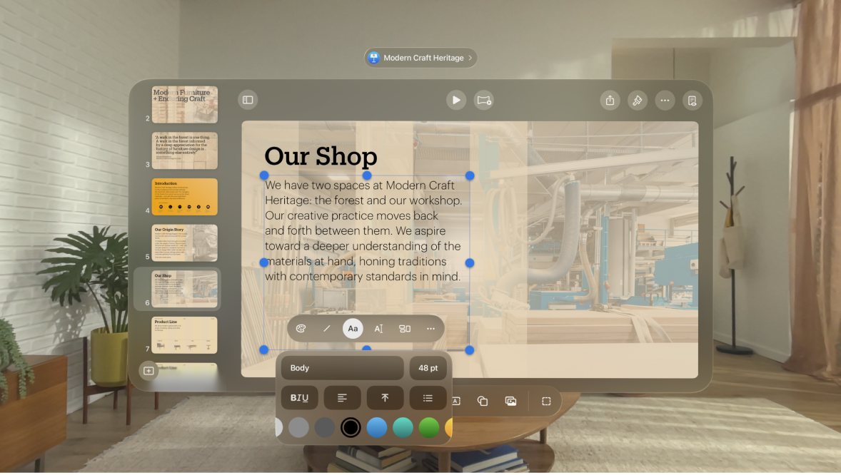 The Keynote app on Apple Vision Pro, showing a selected text box with formatting options below it.