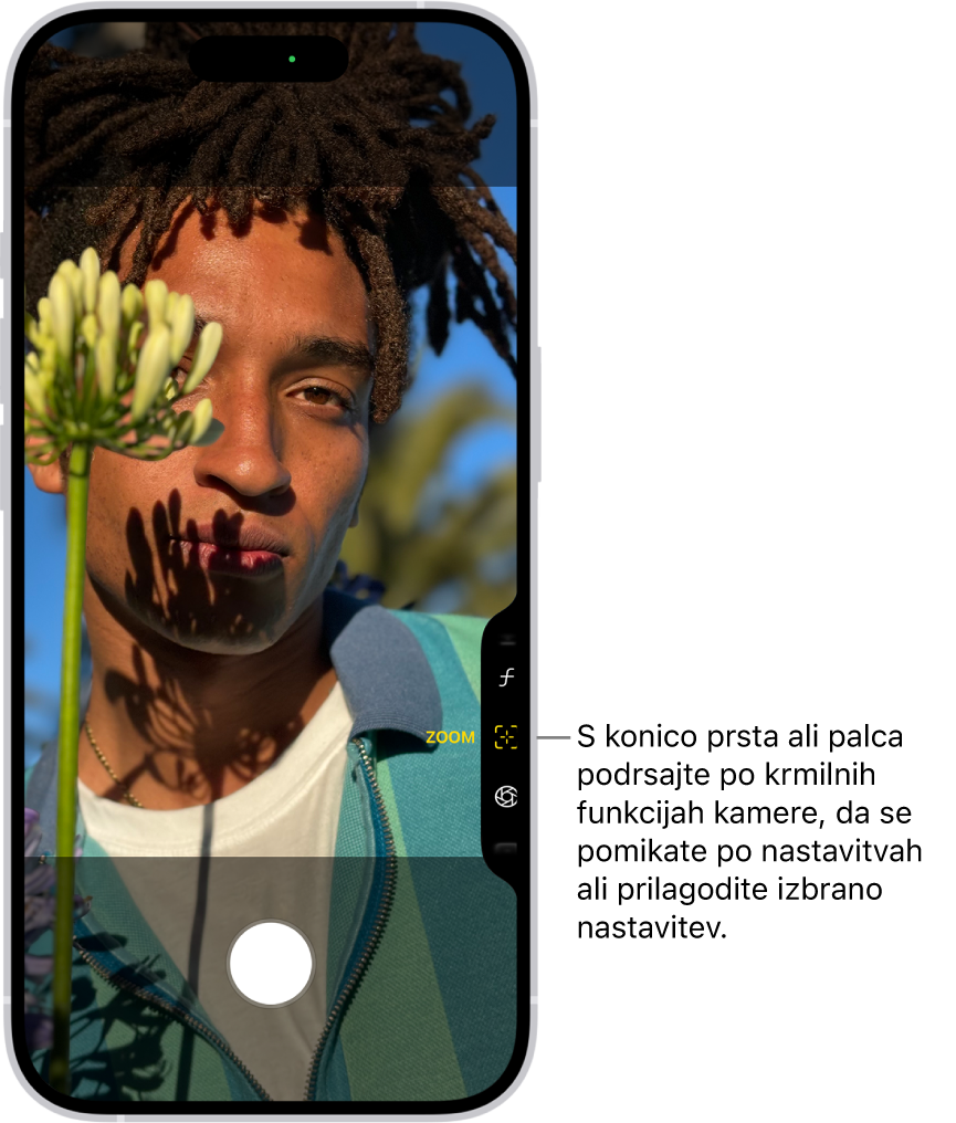 Meni Krmilna funkcija kamere je odprt v aplikaciji Kamera. Izbran je gumb Povečava.