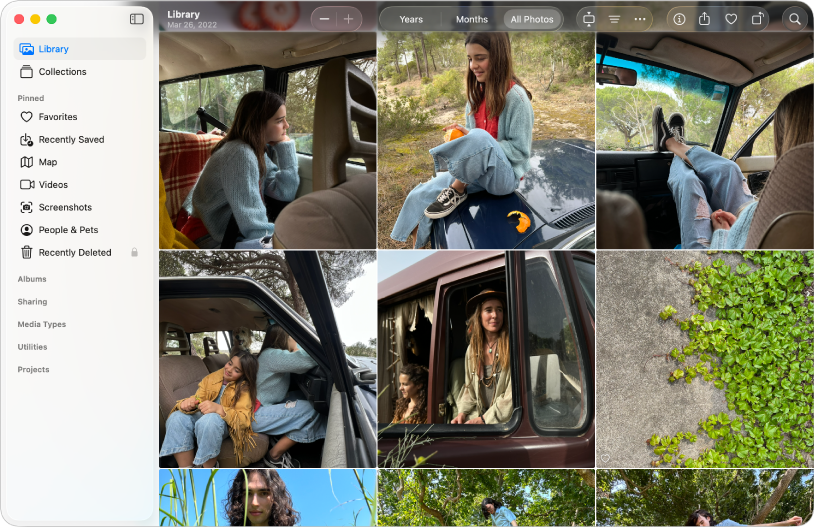 Het hoofdvenster van Foto's met aan de linkerkant 'Bibliotheek' geselecteerd in de navigatiekolom, aan de rechterkant foto's geordend in een raster en in de knoppenbalk aan de bovenkant de knoppen 'Jaren', 'Maanden' en 'Alle foto's'.