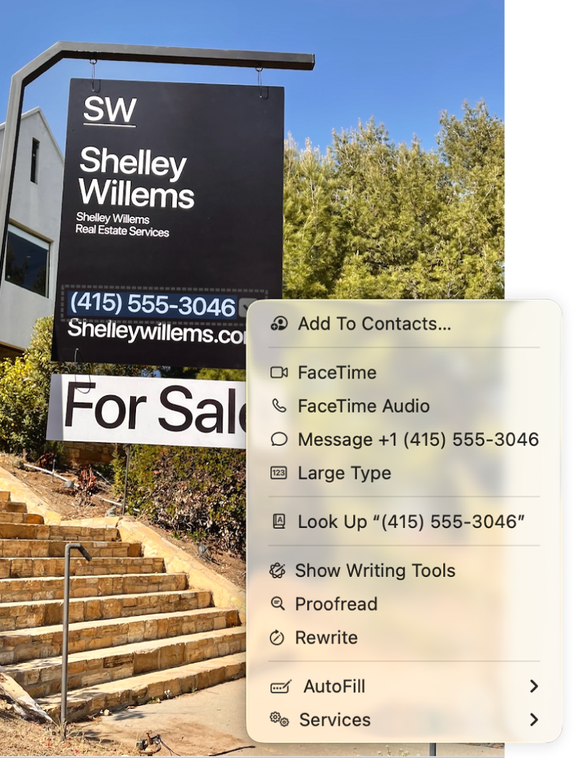 Fotografia de um sinal de imobiliário para venda a mostrar o número de telefone do agente selecionado como “Texto ao vivo” e um menu a apresentar as opções para adicionar o número de telefone aos Contactos, ligar para o número, iniciar uma chamada FaceTime, enviar uma mensagem de texto, etc.
