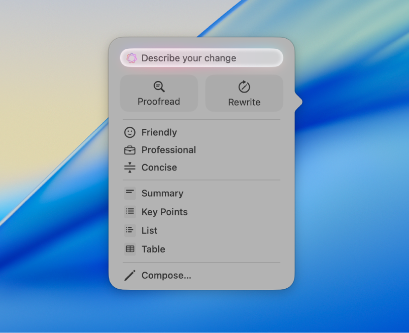 The Writing Tools dialog on the Mac wallpaper. The dialog has a Describe your change field at the top, followed by Proofread and Rewrite buttons. You can choose a Friendly, Professional, or Concise tone below that, and at the bottom are Summary, Key Points, Table, and List buttons.