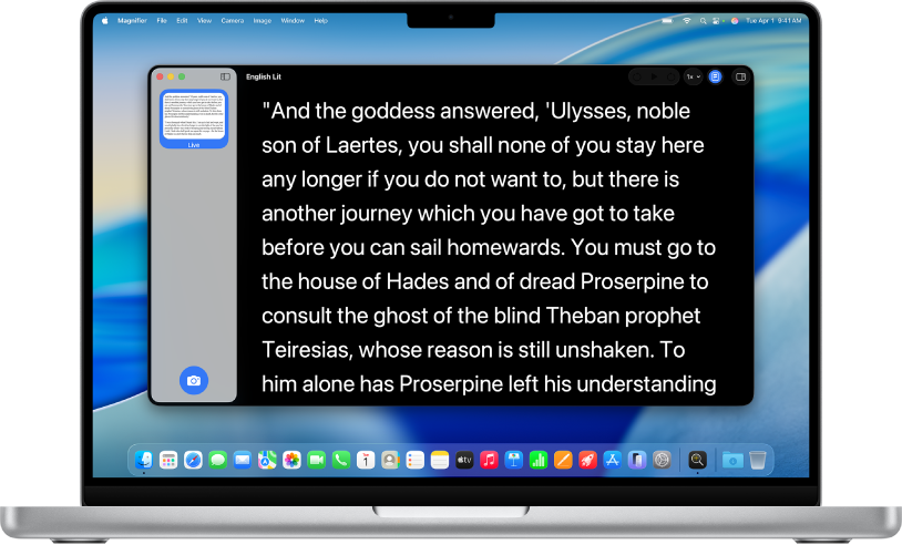A Mac with the Magnifier window open on the desktop. Text from a screen is displayed in large font on a black background.