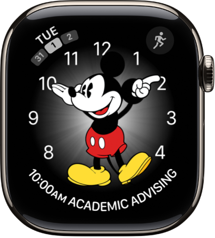 The Mickey Mouse watch face where you can add many complications. It shows three complications: Messages at the top left, Workout at the top right, and the date at the bottom.