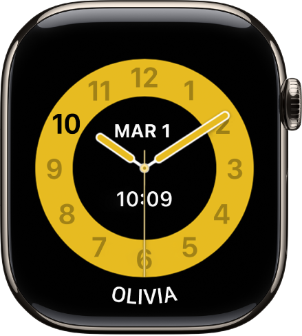 Le cadran du mode École affichant une horloge analogique avec la date et l’heure numérique vers le milieu.