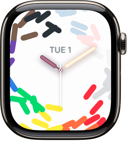 प्राइड सेलिब्रेशन घड़ी का फ़ेस, प्राइड के रंगों को कन्फ़ेटी के रूप में प्रदर्शित कर रहा है और मध्य में तिथि और समय दिखा रहा है।