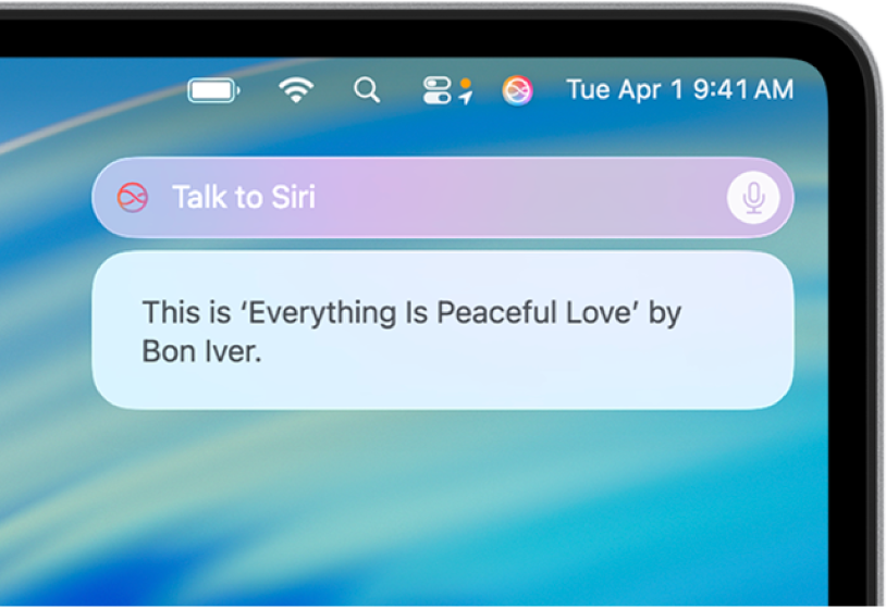 O campo do pedido de Siri e a resposta encontram-se no canto superior direito da secretária do Mac.