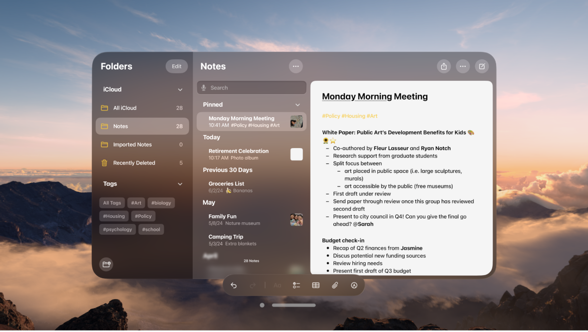 A user’s view on Apple Vision Pro. An app window is visible, and an Environment is showing in the background.