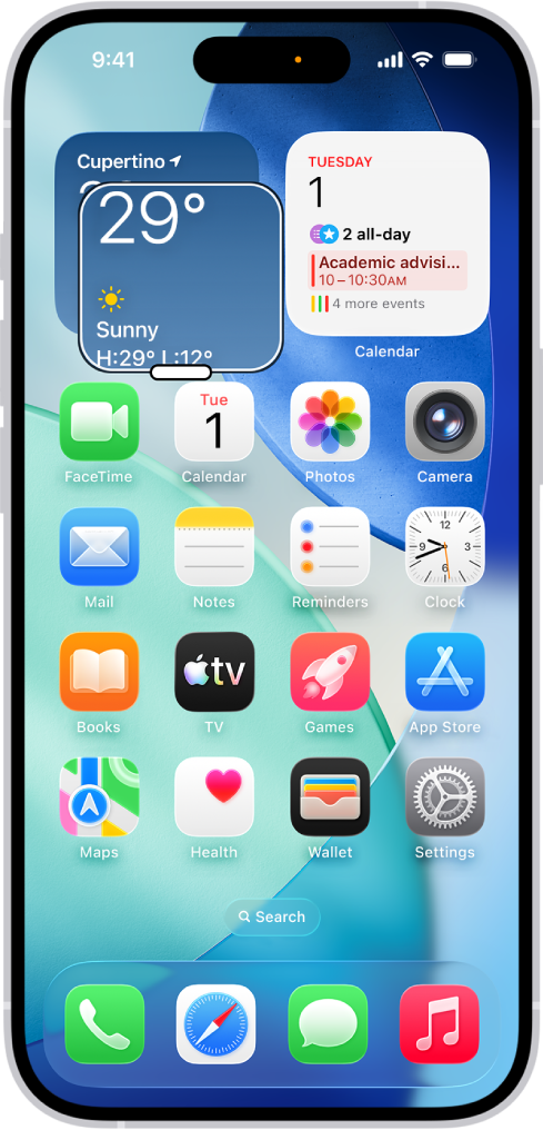 „iPhone“ įrenginyje rodomas pradžios ekranas, kuriame matomas padidintas langas vienoje ekrano dalyje.
