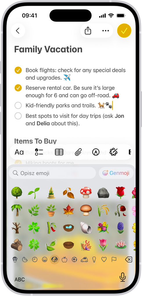 Notatka otworzona w aplikacji Notatki, widoczna w górnej części ekranu. W dolnej połowie ekranu wyświetlana jest klawiatura emoji.