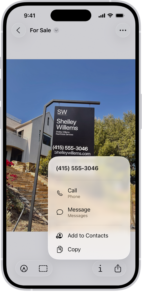 O poză cu pancarta unui agent imobiliar, cu numărul de telefon evidențiat. Numărul de telefon apare în meniu deasupra opțiunilor Apelați, Mesaj, Adăugați în Contacte și Copiați.