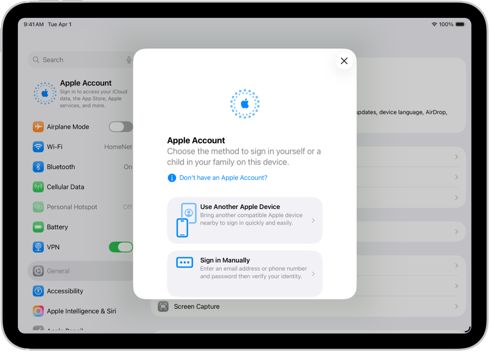 Obrazovka Nastavení, na které se uprostřed zobrazuje dialogové okno přihlášení k účtu Apple