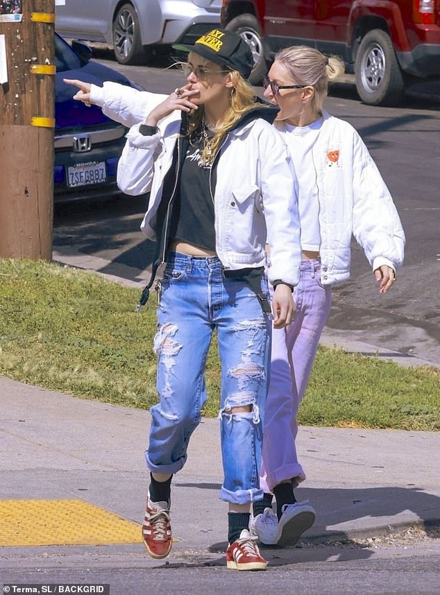 Kristen Stewart puffed on a cigarette as she headed for lunch in Silver Lake, Los Angeles with fiancée Dylan Meyer on Monday