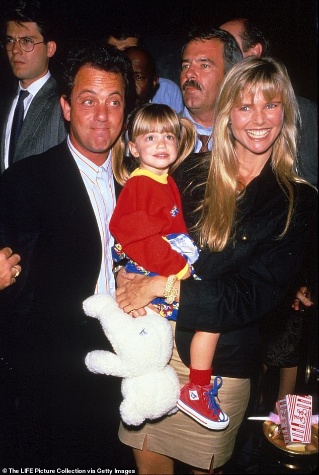 Reflecting on the breakup, she added, 'In the end, when the relationship isn¿t functioning the way you want it to be anymore ¿ that¿s the worst kind of loneliness because you just can¿t make it work together and that¿s painful,' (with daughter Alexa Ray circa 1988)