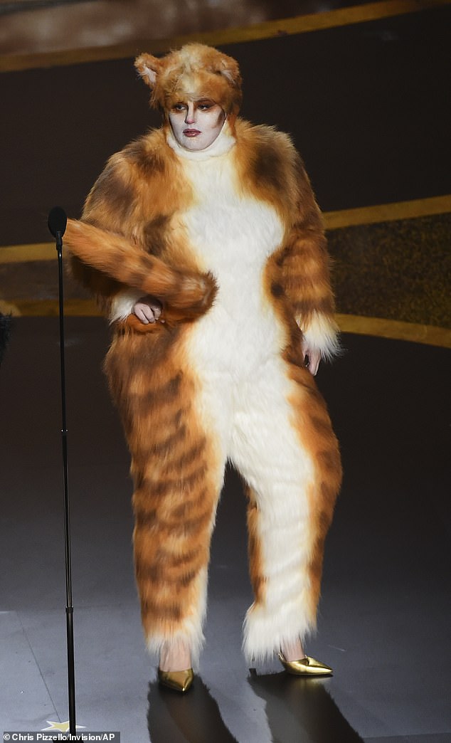 Cats had recently hit cinemas, so bosses rung up star Rebel to ask if she could present on the night - however, the catch was that she would have to present dressed as a cat (Pictured)