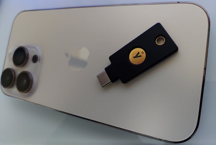 Yubico Security C NFC on top on an iPhone