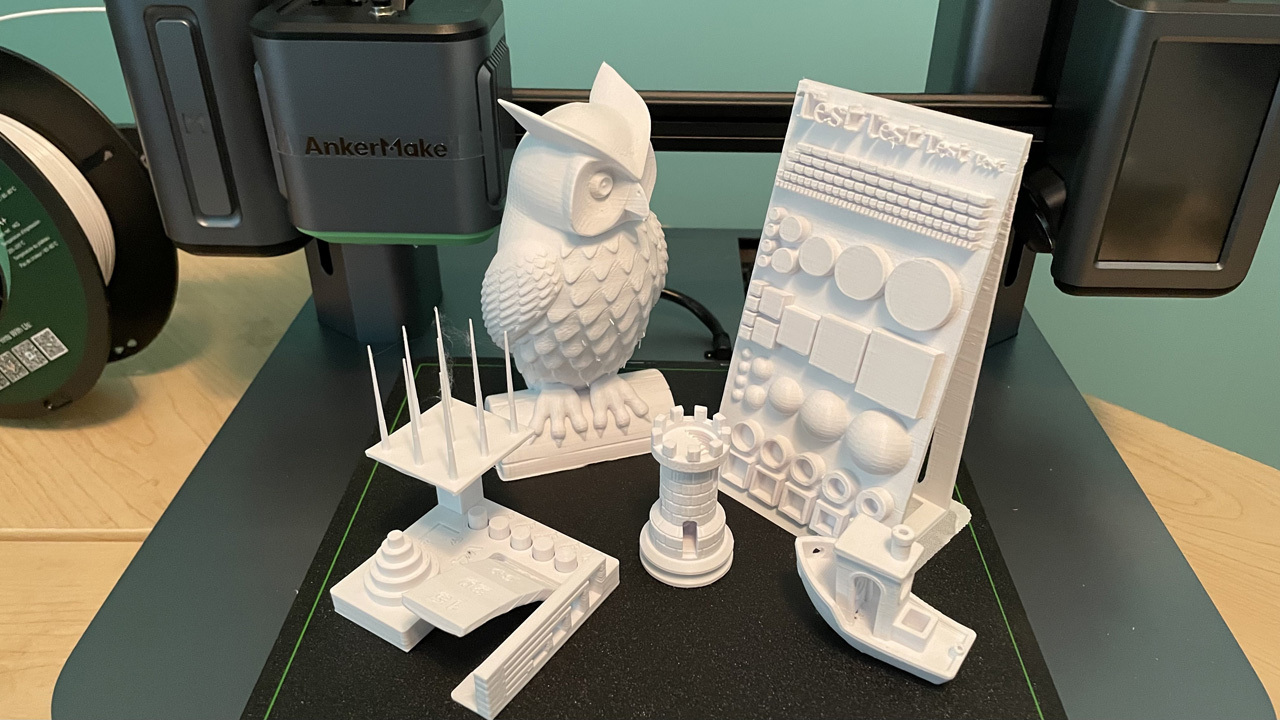 The print bed on the AnkerMake M5 with test prints