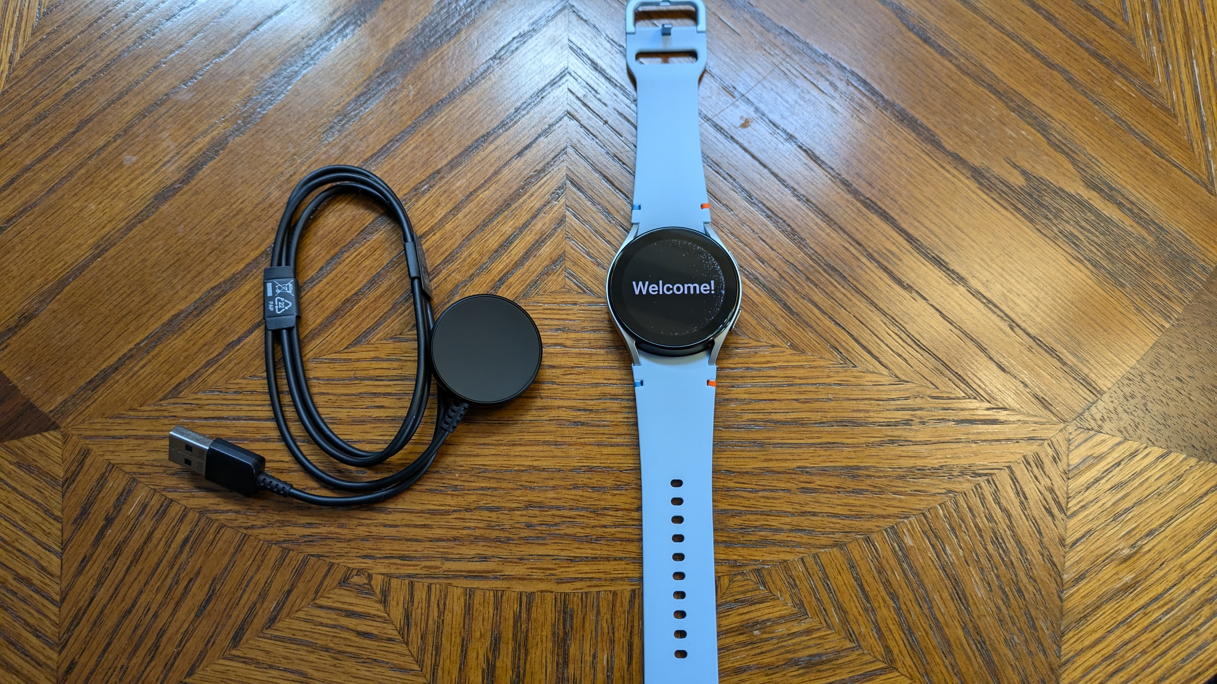 The watch and its charger