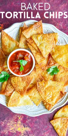 baked tortilla chips on a plate with salsa