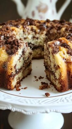 a cake that is cut in half on a plate