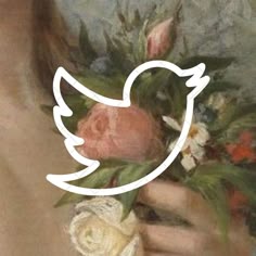 a woman holding a bouquet of flowers in front of her face with the word twitter on it