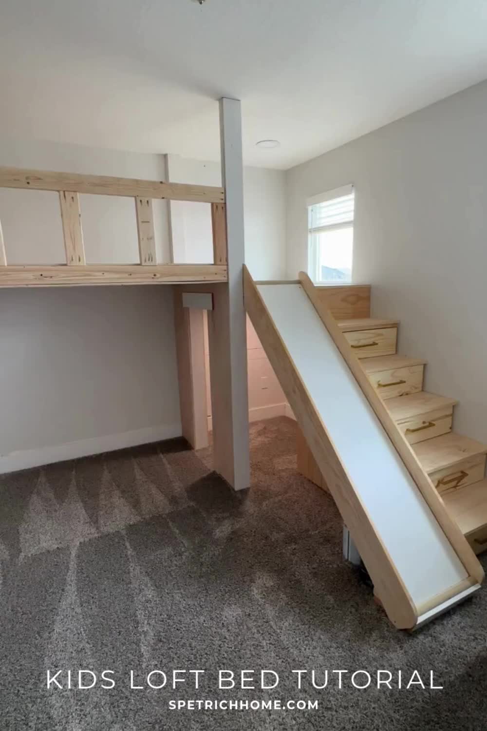 This contains: Video shows a tour of a kids loft bed with a slide and stairs.
