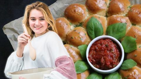 Tilly Ramsay standing with a mixing bowl next to some garlic twisted doughballs
