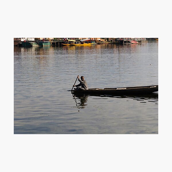 Item preview, Kashmiri man rowing a small wooden boat designed and sold by ashishagarwal74.