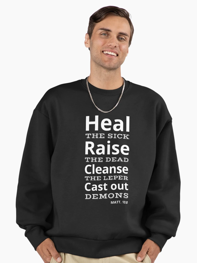 Thumbnail 2 von 6, Premium Oversized Pullover, Heile die Kranken, erwecke die Toten, reinige den Aussätzigen, vertreibe Dämonen designt und verkauft von Josephines-ZA.