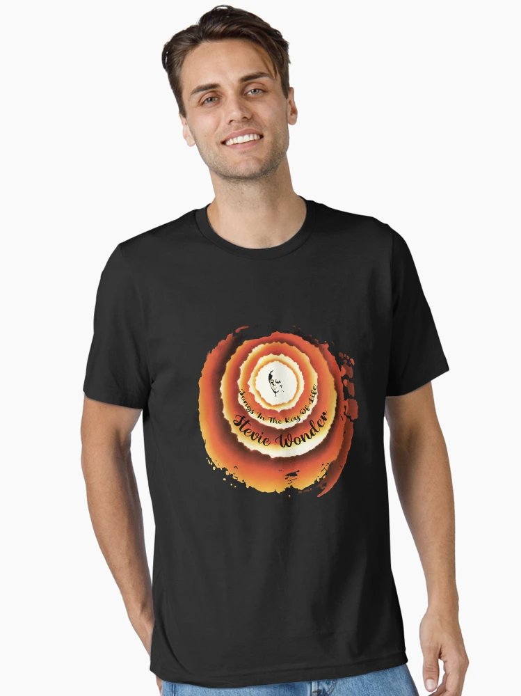Aperçu 2 sur 7. T-shirt essentiel avec l'œuvre Chansons dans la clé de la vie créée et vendue par RenaTorresGJ.